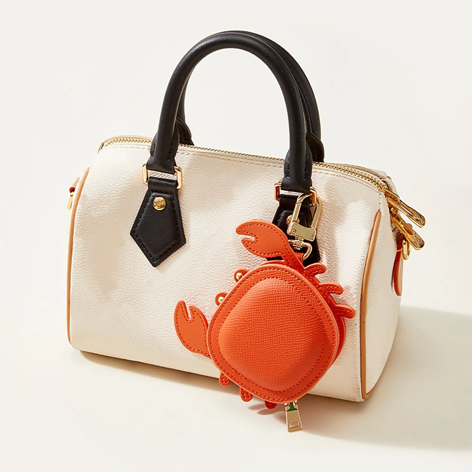 Crap charm, genuine leather coin purse, headphone bag pendant, cute accessory for bags and backpacks, creative and exquisite.